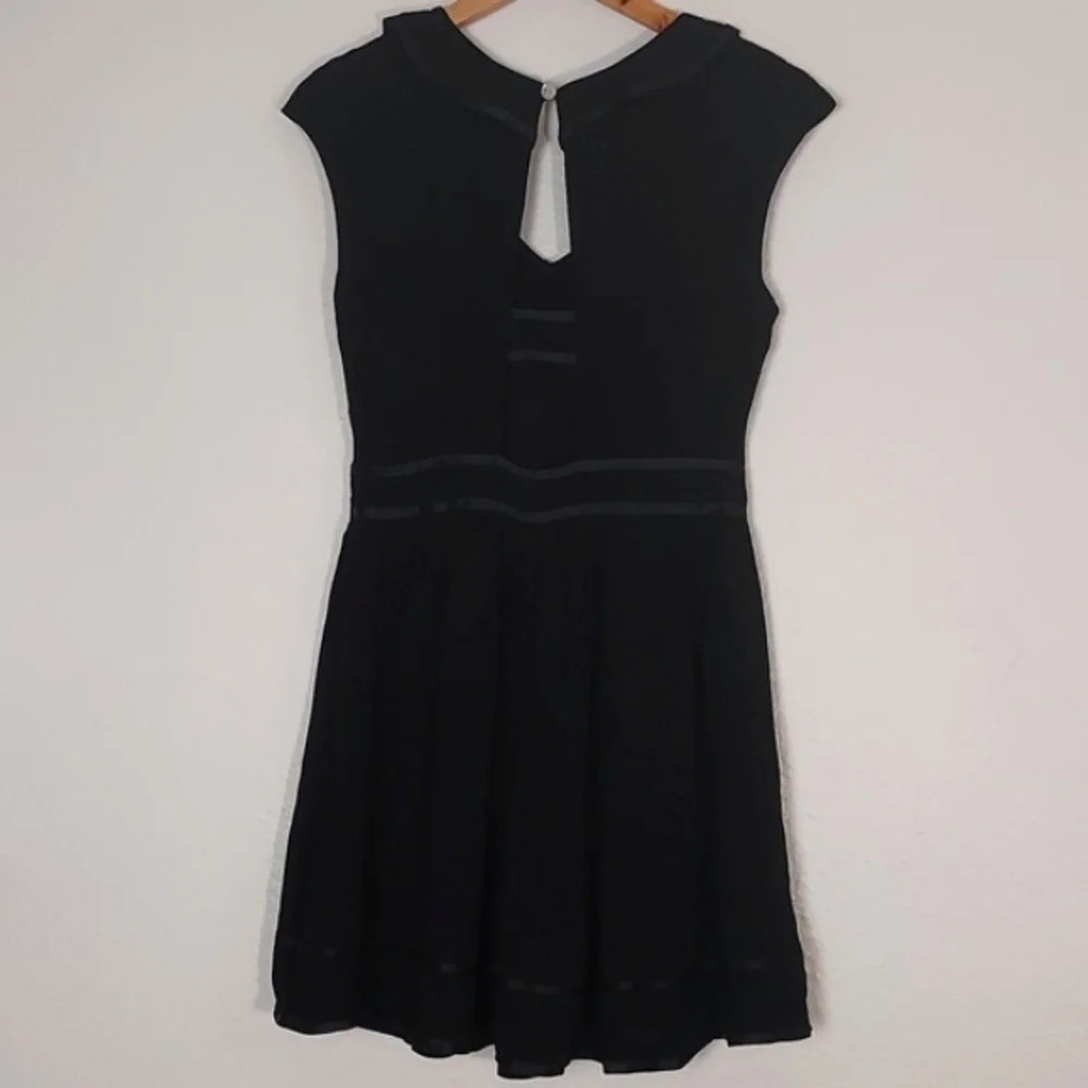 Anthropologie Romper Ruffled Black Size 6